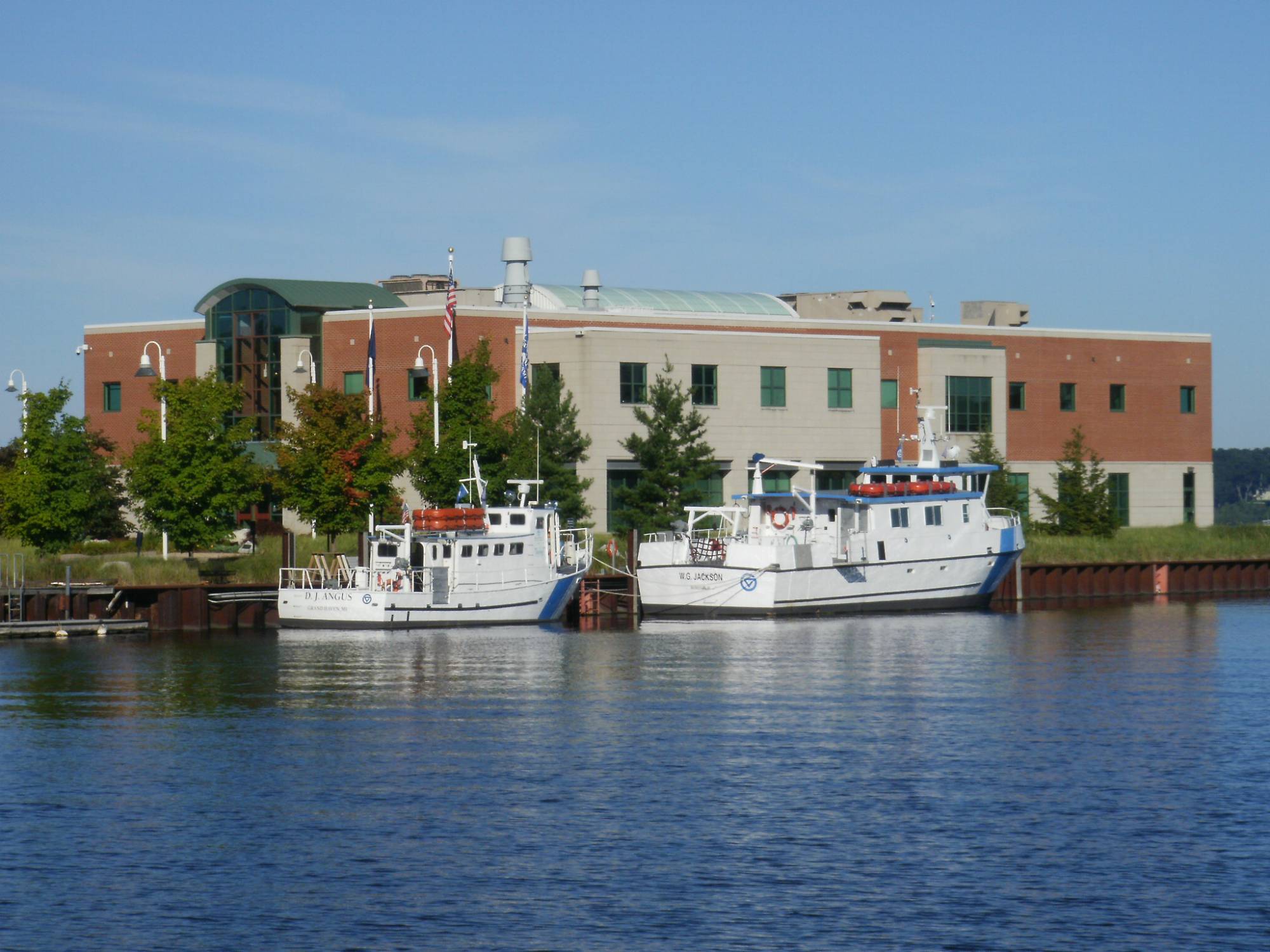 Picture of the WG Jackson and DJ Angus research vessel docked along AWRI on Muskegon Lake.